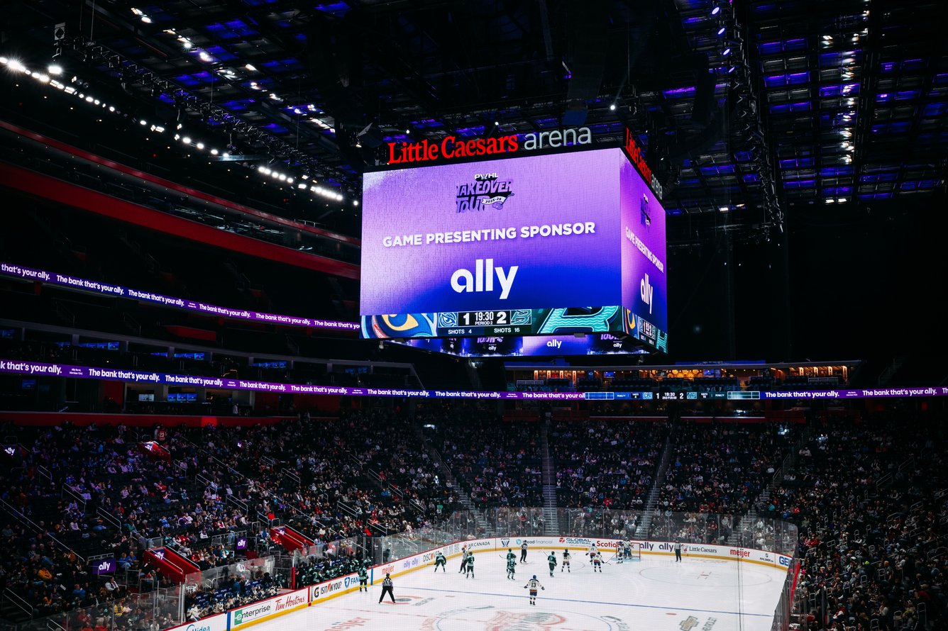 Wide shot of players on the rink at a PWHL Takeover Tour game.