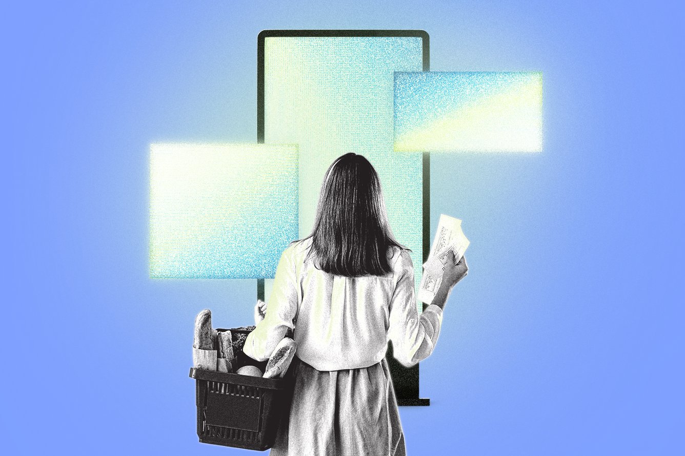 A woman with a shopping cart looking at retail media advertisement screens